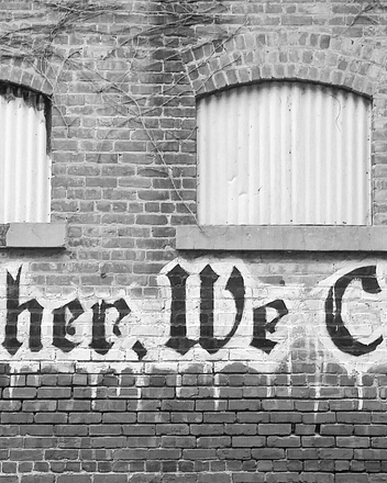 Bild: Steinwand mit Graffiti: Together we create!